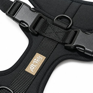 Black soft padded dog harness, detail view